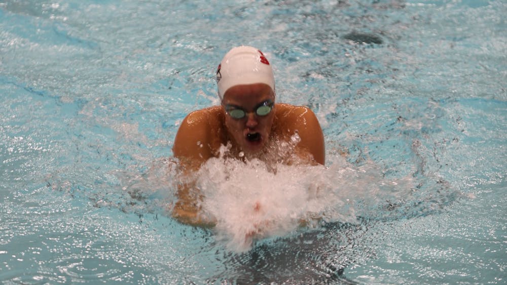 Ball State Senior Alex Bader swims the breaststroke leg of the 200 yard medley relay on Oct. 30 at Lewellen Aquatic Center. The Cardinal relay team won the event with a time of 1:44.76.