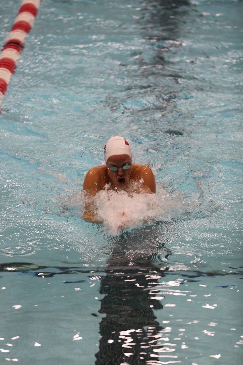 Ball State Senior Alex Bader swims the breaststroke leg of the 200 yard medley relay on Oct. 30 at Lewellen Aquatic Center. The Cardinal relay team won the event with a time of 1:44.76.