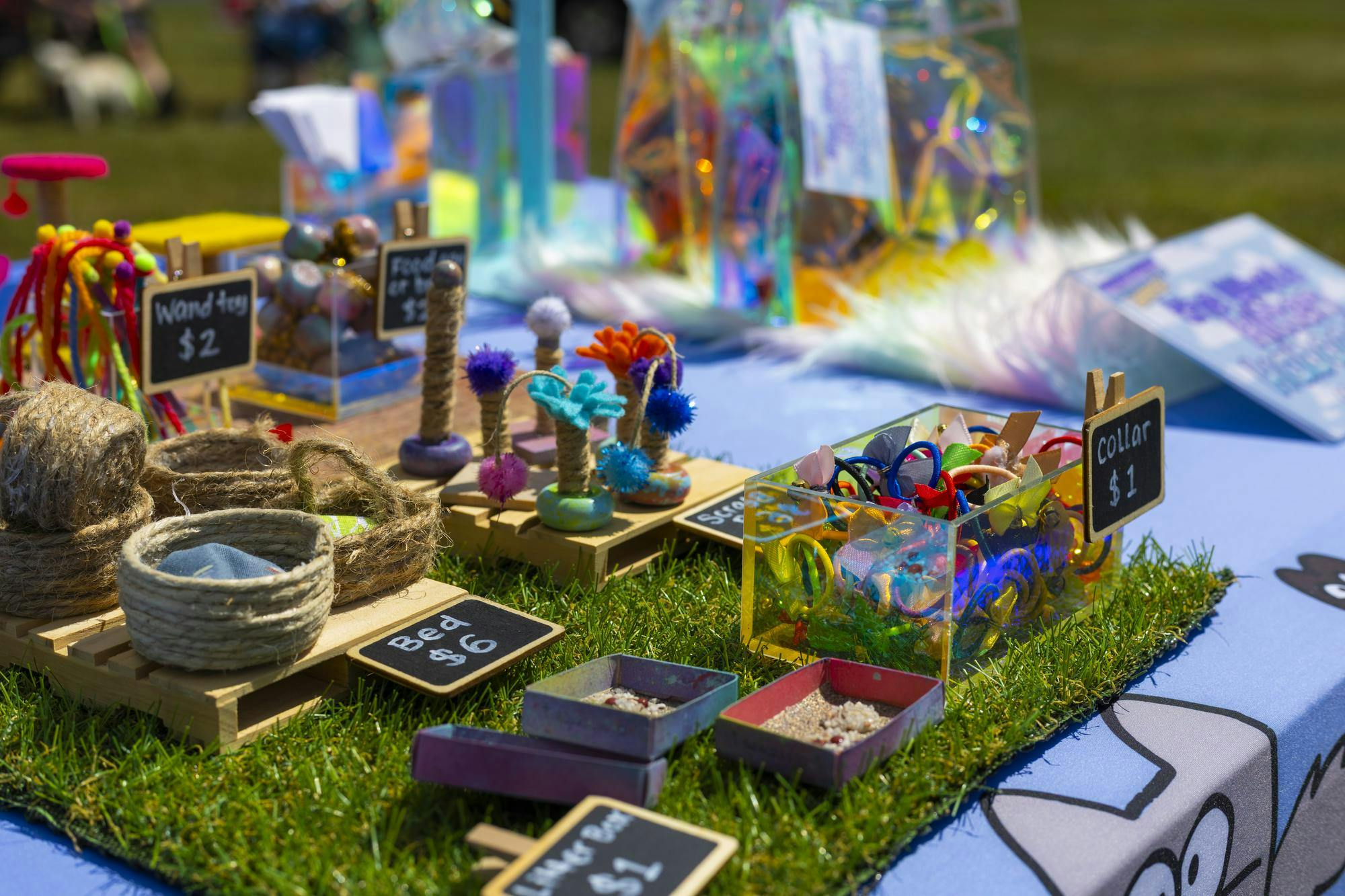 Vendor sells miniature cat items for charity at the Grateful Tail Wagging Showcase Sept. 7 in Yorktown Ind. The showcase included pet related vendors, a dog food giveaway and a 5k fun run. Brenden Rowan, DN