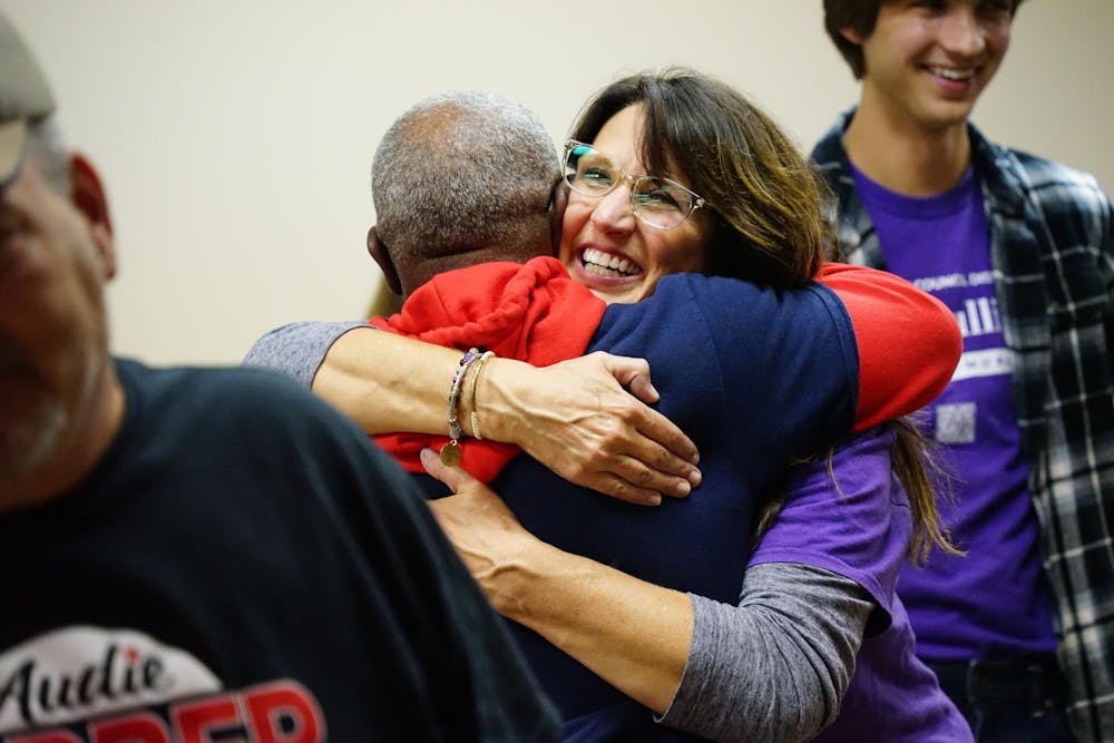 City Council candidates Sara Gullion and Harold Manson celebrate together after receiving unofficial victory at the Delaware County Democratic Headquarters Nov. 7, 2023. Kate Farr, DN