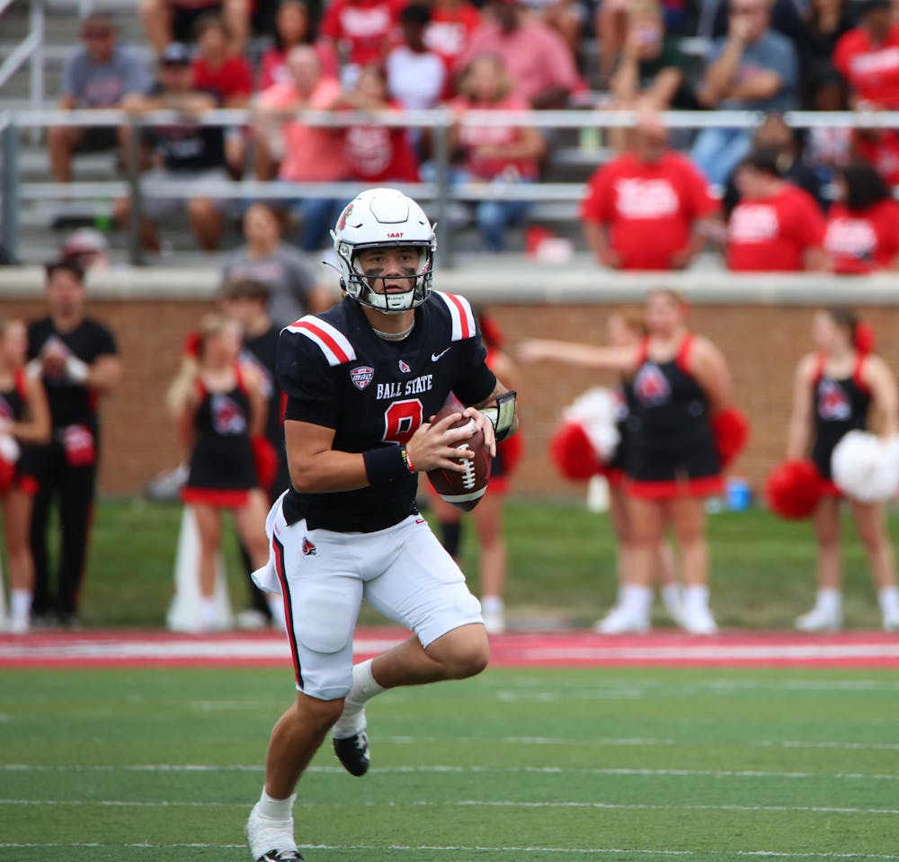 Freshman quarter back Kadin Semonza looks to throw the ball against Indiana State Sept. 16 at Sheumann Stadium. Semonza had two fumbles in the game. Mya Cataline, DN