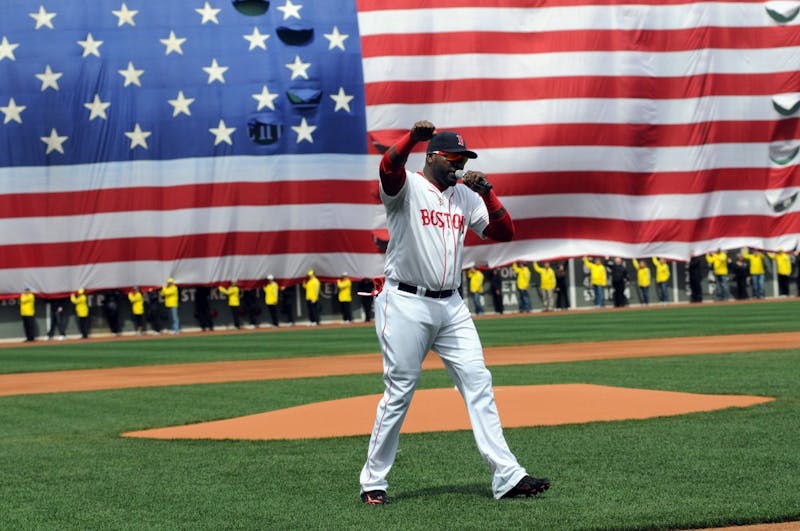 Boston's Big Papi addresses the crowd on Saturday, April 20, 2013, during the Red Sox versus Kansas City Royals opening day ceremony, which paid tribute to the victims of the Boston Marathon in Boston, Massachusetts. (Faith Ninivaggi/Boston Herald/MCT/TNS)