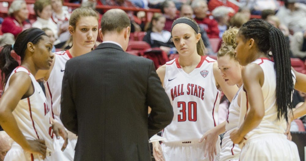 Head coach Brady Sallee talks to his players during a timeout at the game against Western Michigan on Jan. 10 at Worthen Arena. DN PHOTO BREANNA DAUGHERTY