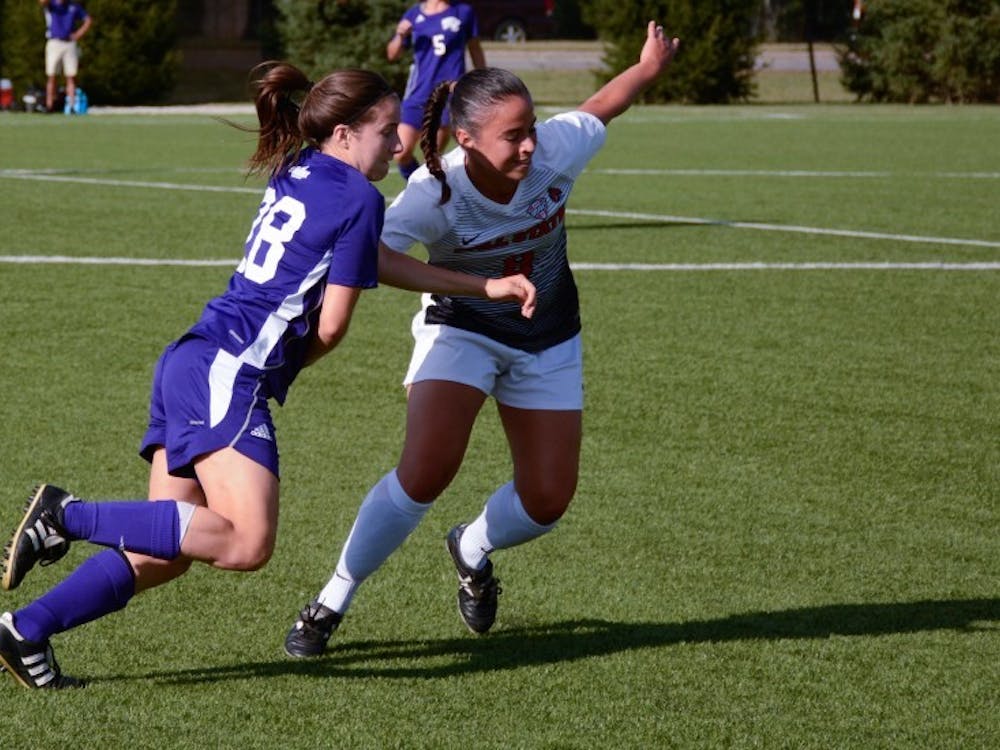 Junior midfielder Paula Guerrero fights for ball on Sept. 15 at the gae against Western Illinois in Briner Sports Complex. The Cardinals won with one point during the first half and two points during the second. Harrison Raft, DN File