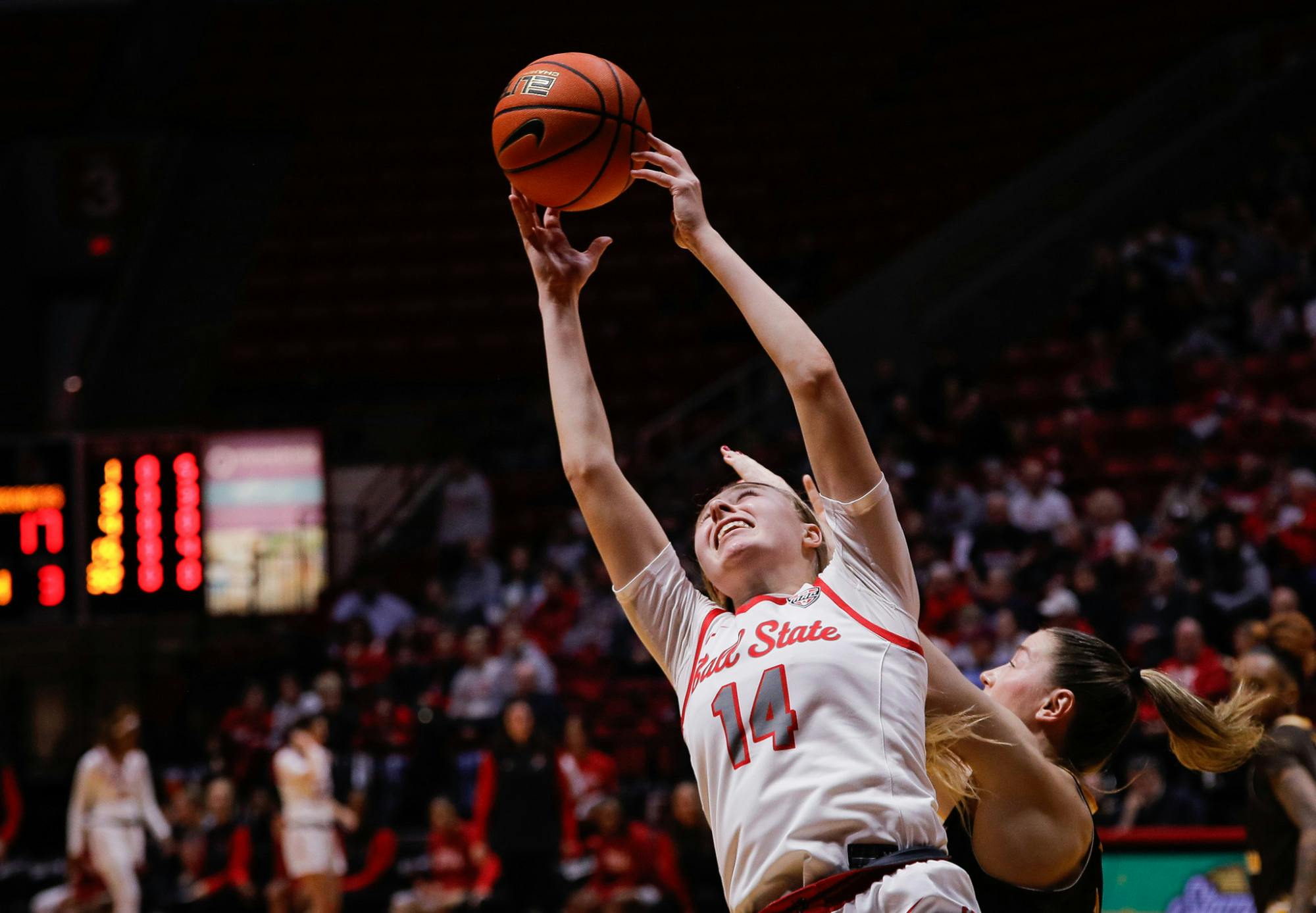 Ball State senior Marie Kiefer reaches for a rebound against Western Michigan Feb. 1 at Worthen Arena. Kiefer had four points for the Cardinals. Andrew Berger, DN 