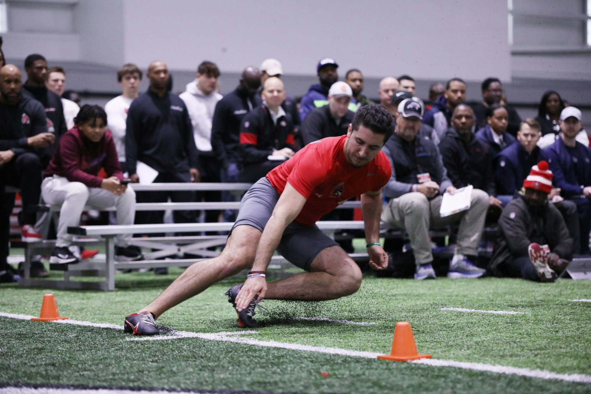 Quarterback Drew Plitt runs a drill at Ball State Pro Day March 28 at the Scheumann Family Indoor Practice Facility. Amber Pietz, DN