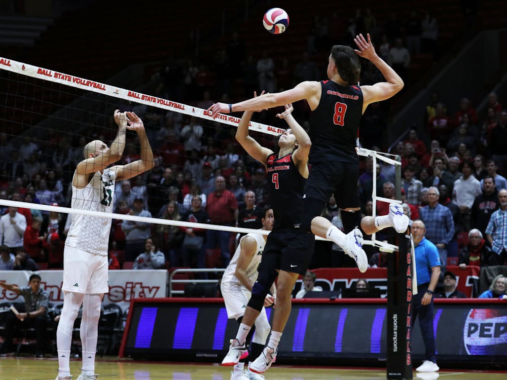 Junior middle blocker Vanis Buckholz goes to spike the ball against Hawaii Jan. 28 at Worthen Arena. Buckholz scored five points in the game. Mya Cataline, DN