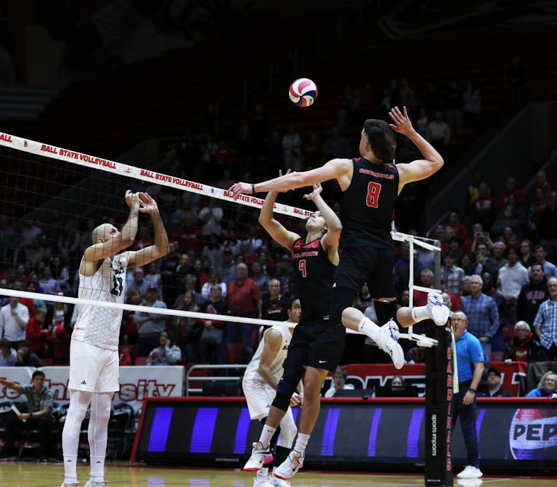 Junior middle blocker Vanis Buckholz goes to spike the ball against Hawaii Jan. 28 at Worthen Arena. Buckholz scored five points in the game. Mya Cataline, DN