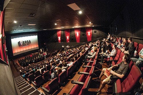 Audience members fill the a screening room at AMC Showplace 12 to see 