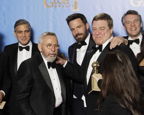 Tony Mendez, center, on whom "Argo" is based, backstage at the 70th Annual Golden Globe Awards show at the Beverly Hilton Hotel on Jan. 13, 2013, in Beverly Hills, Calif. "Argo" claimed a few awards at the ceremony beating out "Lincoln" and "Zero Dark Thirty." MCT PHOTO