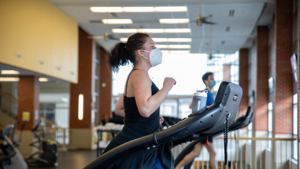Junior theater major Emma Grow runs on the treadmill Feb. 22, 2021, at Jo Ann Gora Recreation and Wellness Center. If you choose to workout indoors at a gym, the CDC recommends to keep your workouts as brief as possible to avoid prolonged exposure. Jaden Whiteman, DN