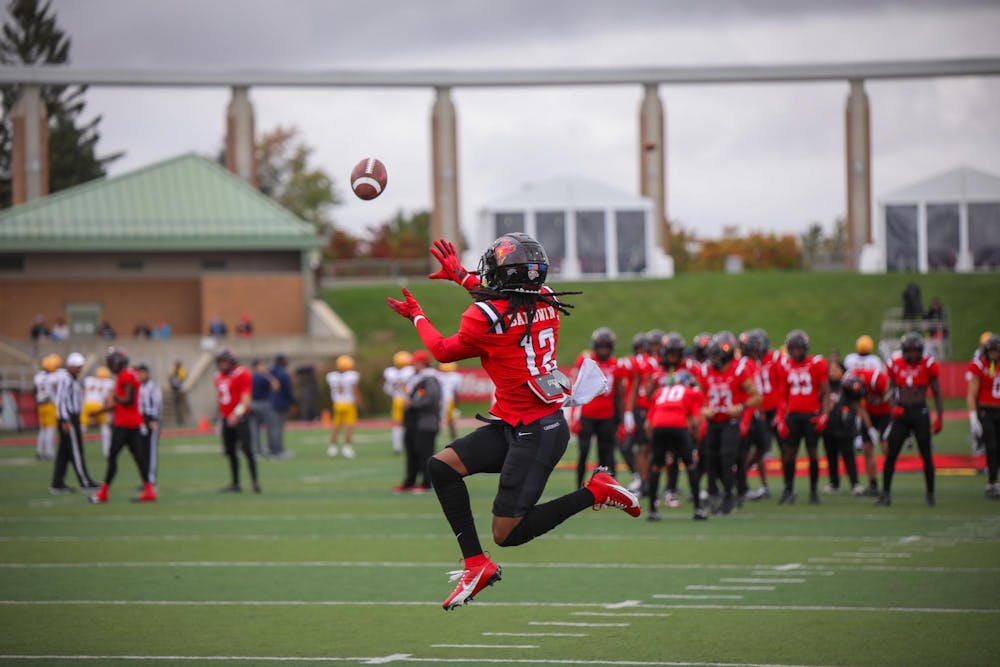 Redshirt sophmore defensive back Thailand Baldwin catches a ball during warm up before a game against Toledo Oct 14 at Scheumann Stadium. Baldwin had 4 solo tackles in the game. Andrew Berger, DN