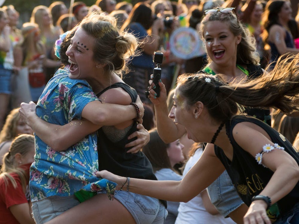 Chi Omega Rachel Sulkoske is welcomed back into her sorority after being a Pi Chi for Bid Day on Sept. 10 at the Quad. Bid Day is where sororities accept their pledges.Rachel Ellis, DN