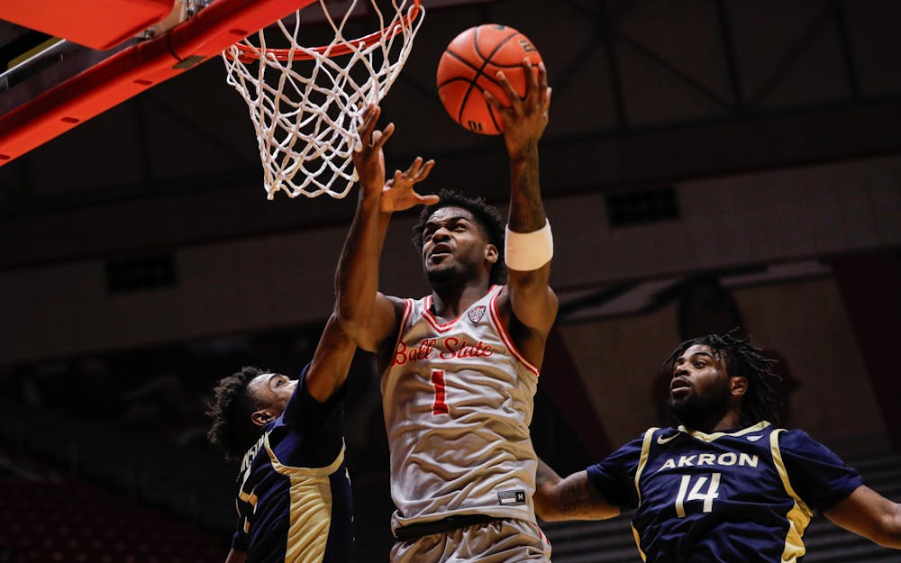 Ball State junior guard Jermarhi Hill puts the ball up for two against Akron Feb. 25 at Worthen Arena. Hill had 26 points for the Cardinals. Andrew Berger, DN 