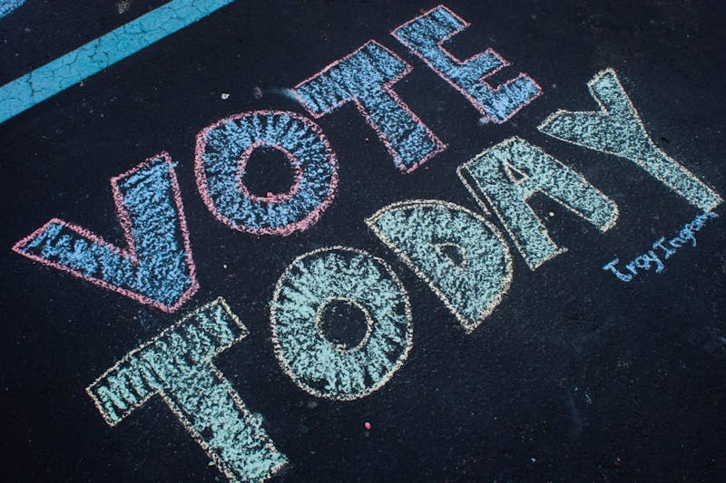 A message written with chalk in the parking lot outside North Side Church of God in Muncie reads "Vote Today." Primary elections for mayor and other positions were held May 7, 2019. Blake Chapman, DN&nbsp;