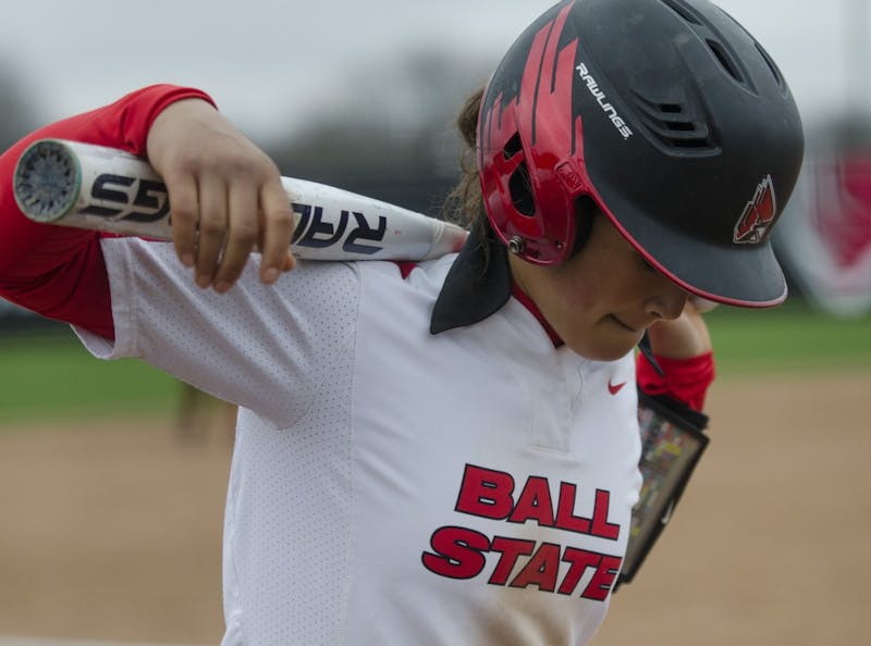 Junior second baseman Maddy Labrador waits in the on-deck circle during the second game of the double-header against Northern Illinois on April 4 at the Softball Field at the First Merchants Ballpark Complex. Ball State won the first game 3-2 and the second game 6-4. Emma Rogers // DN