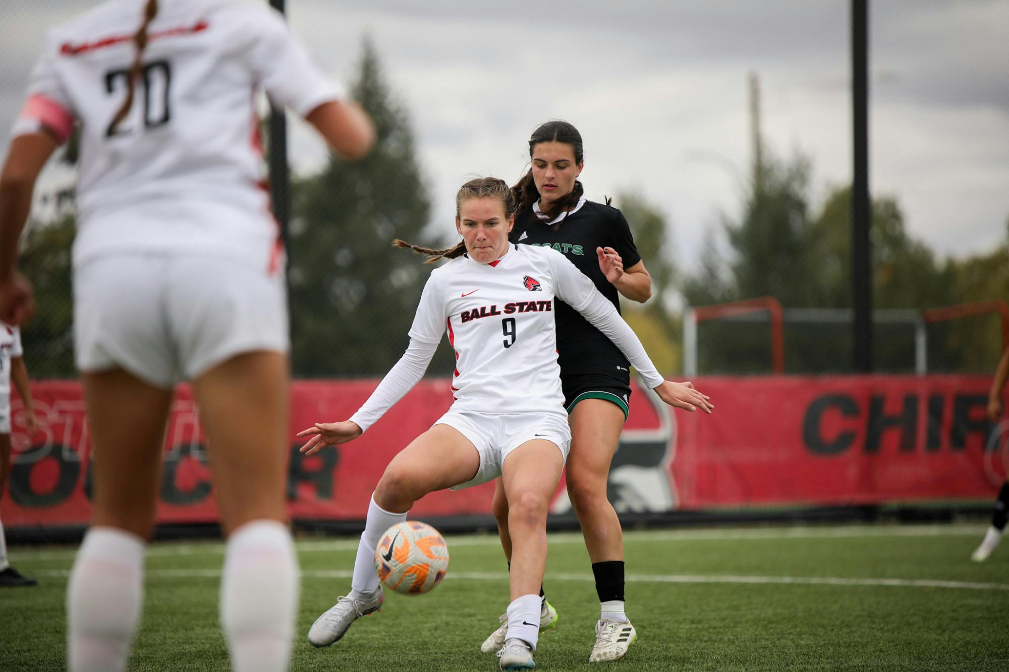 Sophomore forward Emily Roper settles a throw in with a defender on her back in a game against Ohio Oct. 15 at Briner Sports Complex. Roper played 67 minutes in the game. Andrew Berger, DN