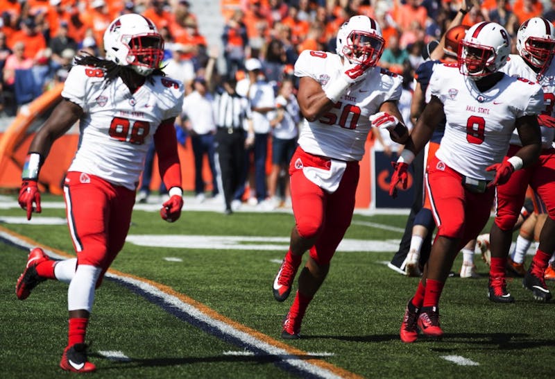 Ball State defensive end Anthony Winbush leads the defense off the field after a sack against the University of Illinois on Sept. 2, 2017. Winbush finished the game with seven total tackles, four of which were for a loss, and three sacks. Robby General, DN