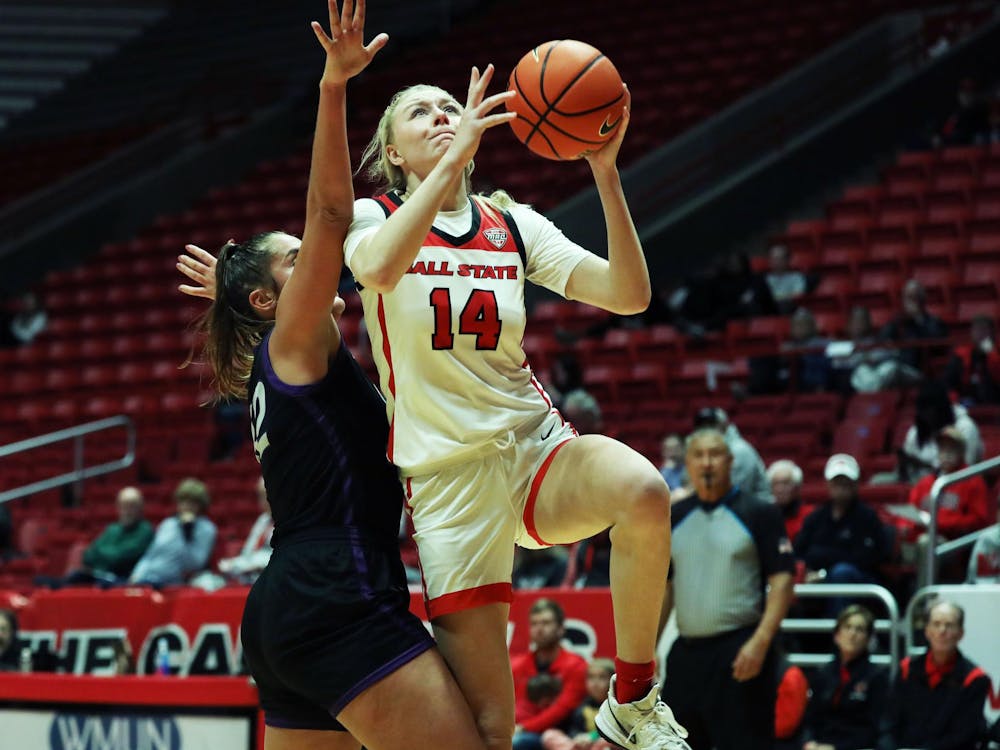 Junior Marie Kiefer jumps to shoot the ball againsts Northern Iowa Nov. 18 at Worthen Arena. Mya Cataline, DN