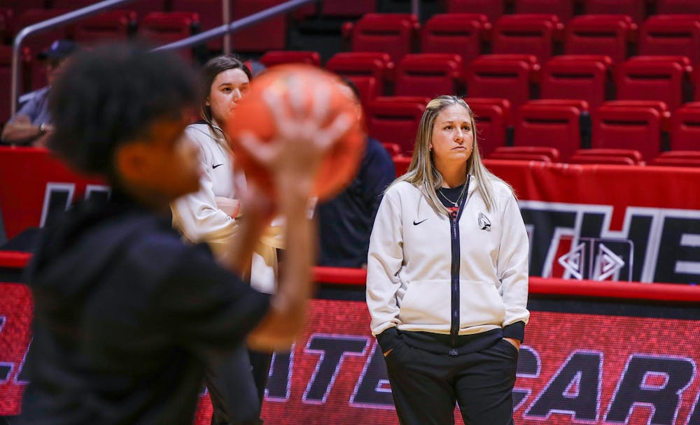 Ball State womens basketball Associate Head Coach Audrey Spencer watches as her team warms up Jan. 24 against Miami 
