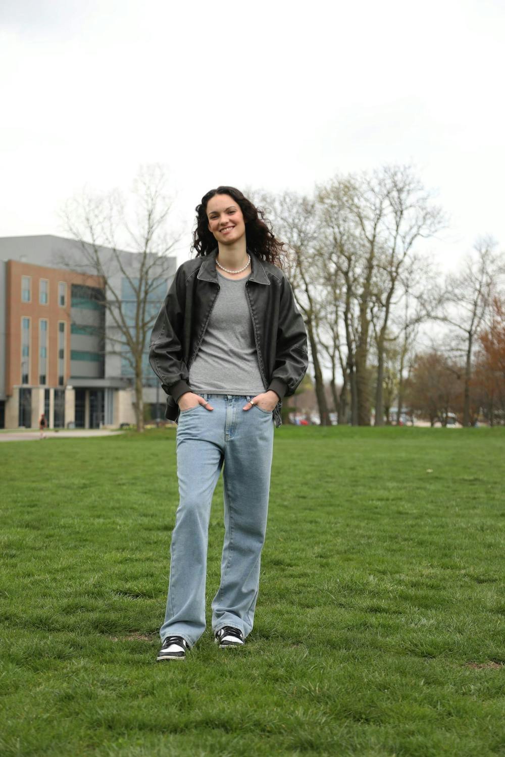 <p>Senior Estel Puiggros poses for a photo April 9 outside Worthen Arena. Puiggros said there isn’t a difference between being a gay athlete and a straight athlete. Mya Cataline, DN</p>