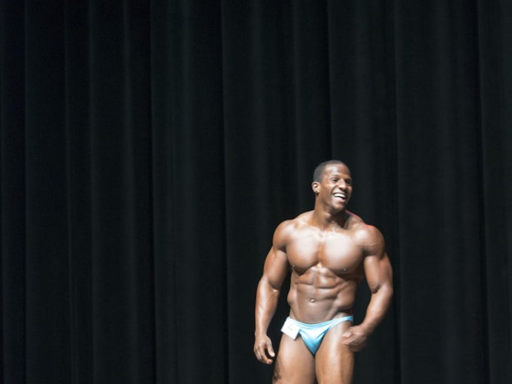 Corey Nelson gets another chance to pose on stage after being named Mr. Bodybuilding Ball State 2016.Twenty students participated in the annual the Mr. and Ms. Bodybuilding Ball State on April 14 in John R. Emens Auditorium. DN PHOTO MAGGIE KENWORTHY