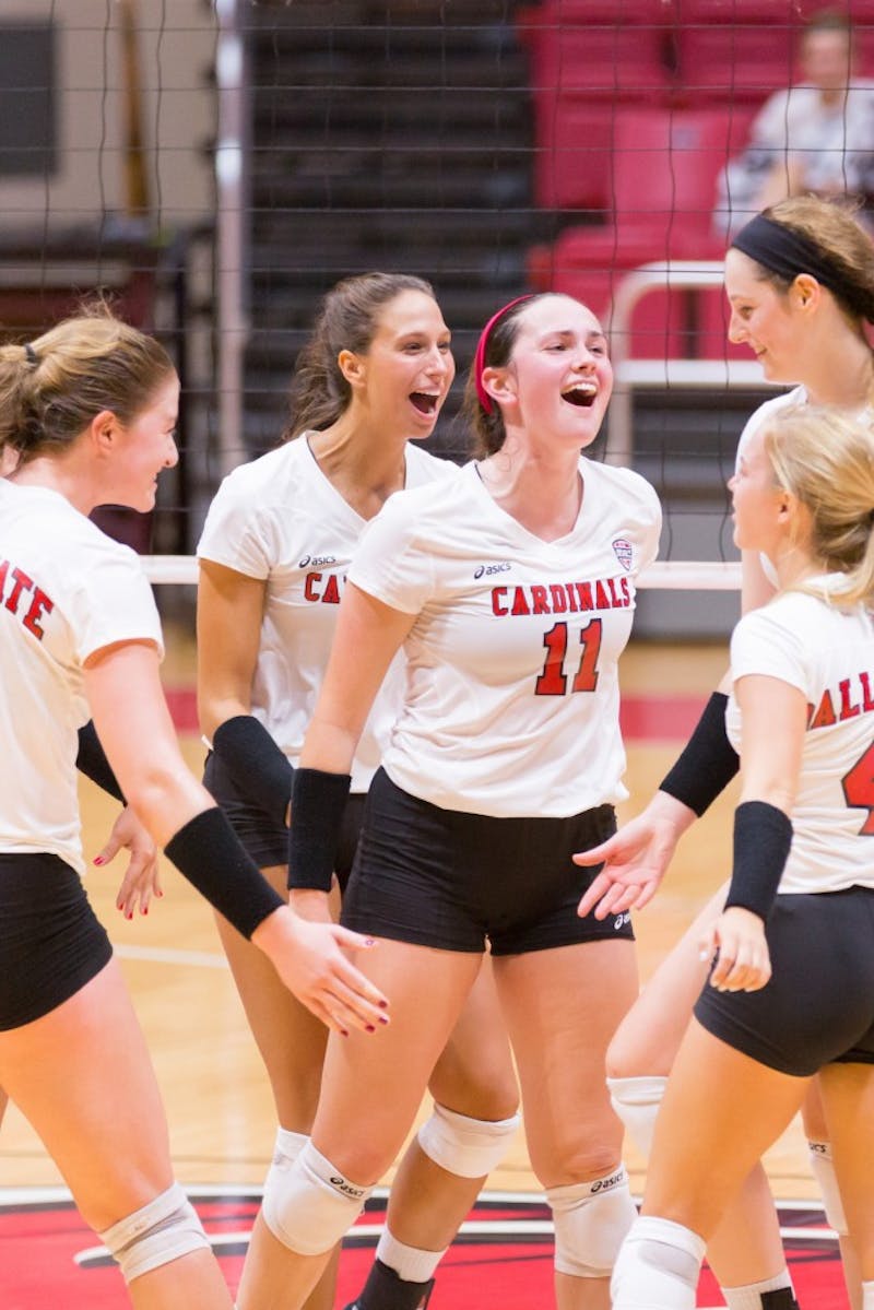 Freshman setter Amber Seaman celebrates after a score with her fellow teammates at the game against IUPUI on Aug. 31, 2016 at John E. Worthen Arena. Friday’s match against Indiana starts at 7 p.m.
 Kyle Crawford // DN File