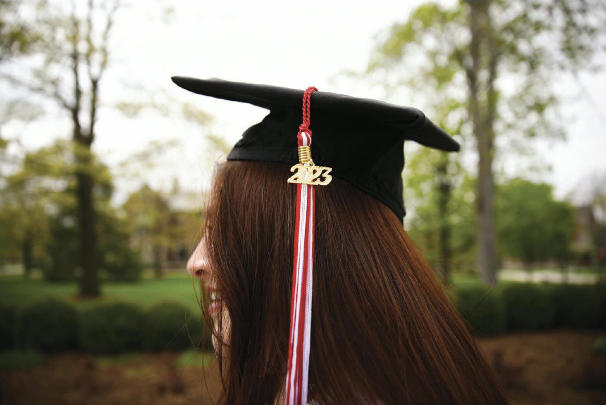 Fourth-year journalism major Angelica Gonzales Morales poses for a photo in front of Beneficence April 22. Jacy Bradley, DN