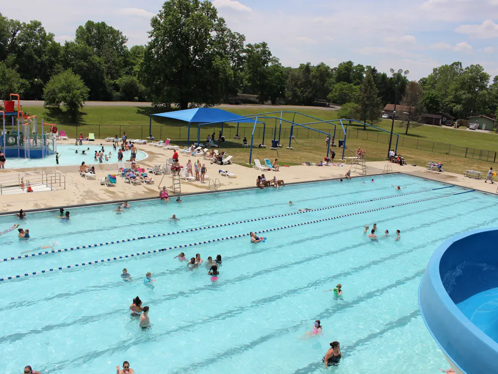Muncie community members swim and sunbathe June 17, 2020, at Tuhey Pool. The pool opened June 15, 2020, nearly three months after the state began COVID-19 regulations. Pool staff followed state health guidelines for cleaning and social distancing. Jenna Gorsage, DN