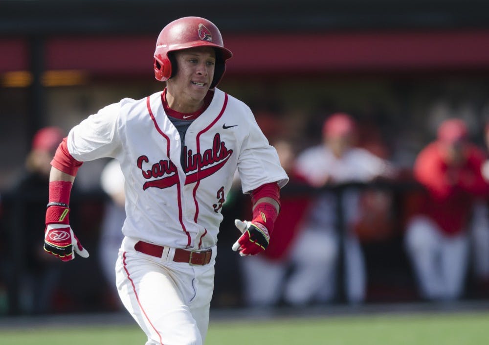 Sophomore outfielder Roman Baisa runs to first base during the game against Ohio University April 2, 2017, at the First Merchants Ballpark Complex. Since its inception, the baseball program has seen 66 players be selected in the MLB draft. Emma Rogers, DN Photo