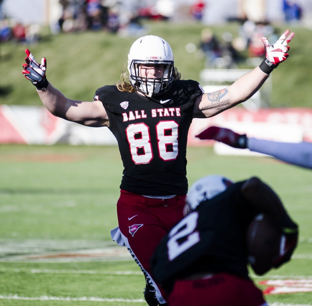 Senior tight end Zane Fakes celebrates a touchdown during the Miami game Nov. 29. DN PHOTO JESSICA MIKSANEK