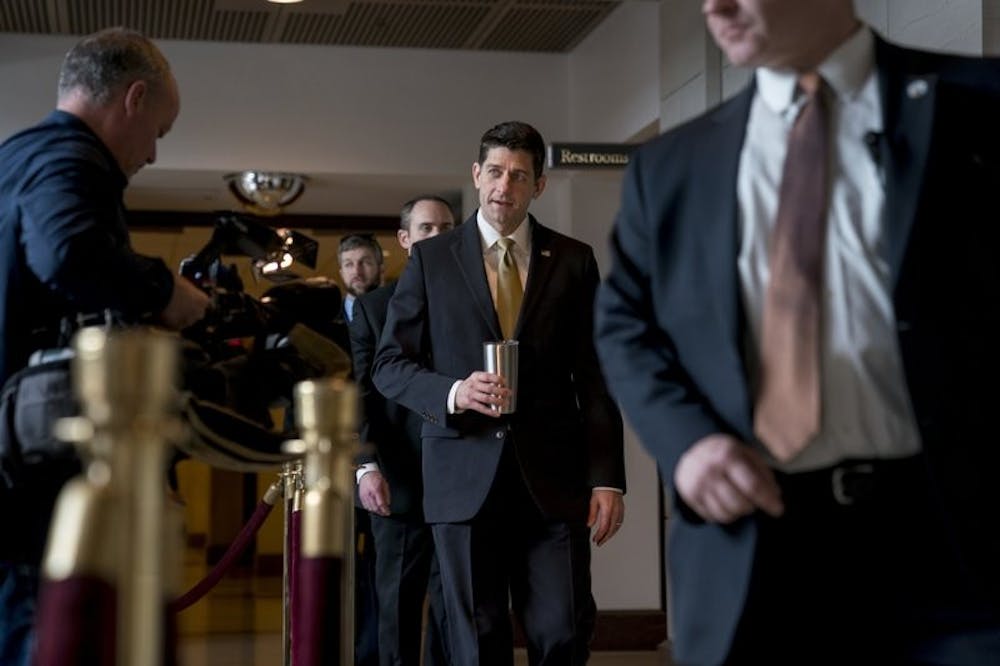 <p>House Speaker Paul Ryan of Wisconsin, center, walks to the Capitol Building from the Capitol Visitor’s Center, Thursday, Jan. 18, 2018, in Washington. <strong>Associated Press, Photo Courtesy&nbsp;</strong></p>