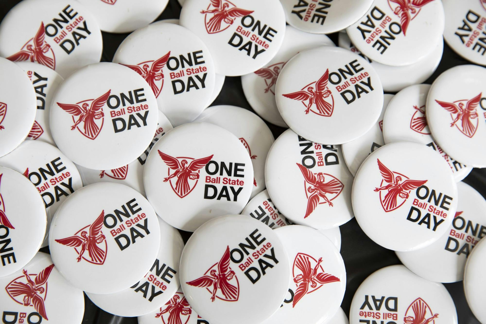 One Ball State Day buttons sit on a table April 6, 2021, in the Letterman Building lobby. In addition to donations, there were challenges for donations during certain periods of time and for the amount raised in competition with other organizations. Jacob Musselman, DN