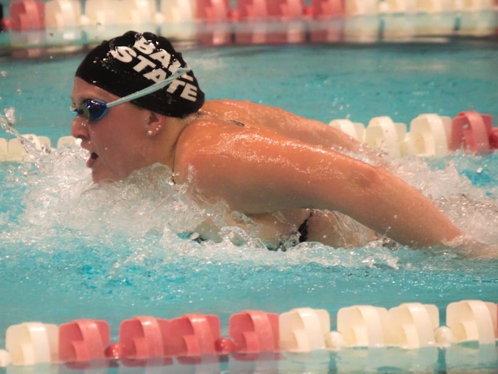 Senior Taci Muszalski swims the butterfly portion of the 200 yard medley relay during the meet against Tiffin on Nov. 11 in Lewellen Aquatic Center. Muszalski's relay team finished with a time of 1:51.27. Teri Lightning Jr., DN