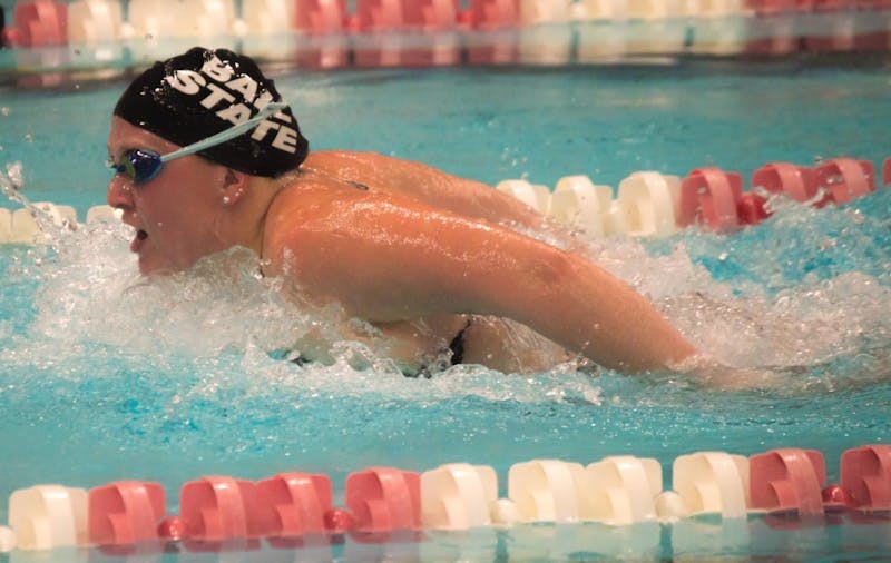 Senior Taci Muszalski swims the butterfly portion of the 200 yard medley relay during the meet against Tiffin on Nov. 11 in Lewellen Aquatic Center. Muszalski's relay team finished with a time of 1:51.27. Teri Lightning Jr., DN