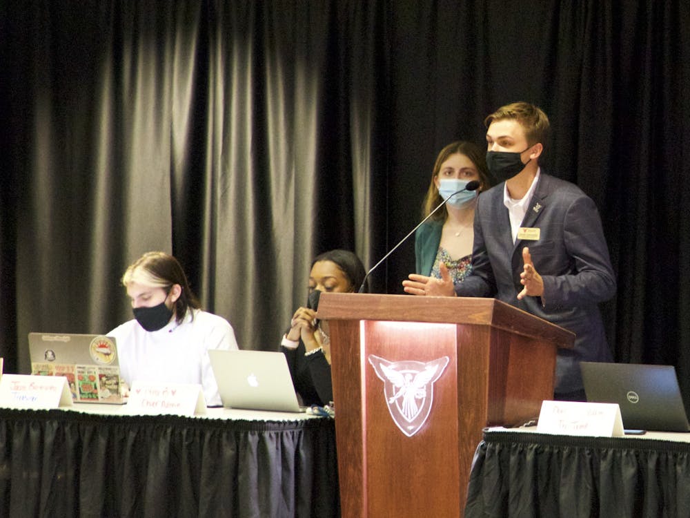 Joseph Gassensmith, chief of staff for Ball State's Student Government Association (SGA) speaks to senators at the SGA meeting Sept. 8. Senators reviewed an amendment that proposes to send an executive slate member to fraternity and sorority life leadership council meetings. Nathan Hill, DN