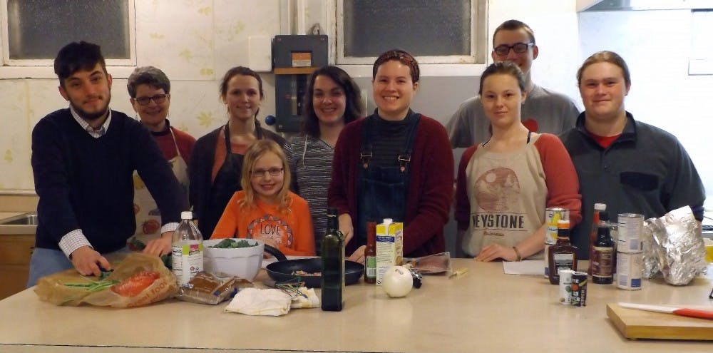 <p>Emily Aker's cooking class prepares their southern themed dish during their weekly class at the United Methodist Church. The nine members split the prep work amongst themselves and teach each other new skills along the way. <strong>Emily Aker, Photo Provided</strong></p>