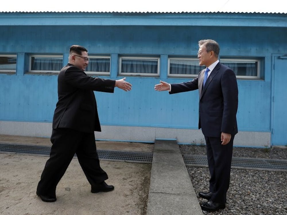 North Korean leader Kim Jong Un, left, prepares to shake hands with South Korean President Moon Jae-in at the border village of Panmunjom in Demilitarized Zone Friday, April 27, 2018. Their discussions will be expected to focus on whether the North can be persuaded to give up its nuclear bombs. Korea Summit Press Pool via AP, Photo Courtesy&nbsp;