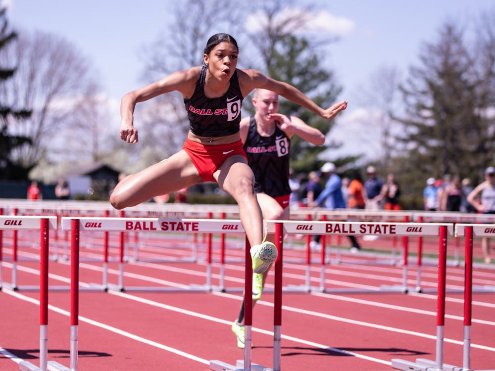 First-year hurdler Mary Porter leaps over hurdles at the Ball State Track and Field We Fly Challenge on April 15 at the University Track at Briner Sports Complex. Katelyn Howell, DN.