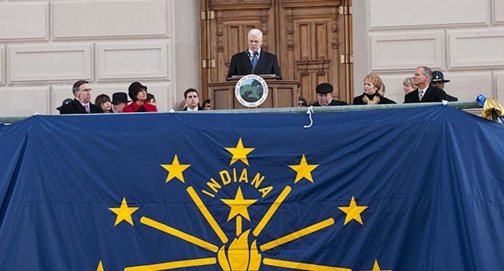 Gov. Mike Pence gives his inaugurual address. The governor expressed admiration for former governor Mitch Daniels saying that no one could ever replace him. DN PHOTO BOBBY ELLIS