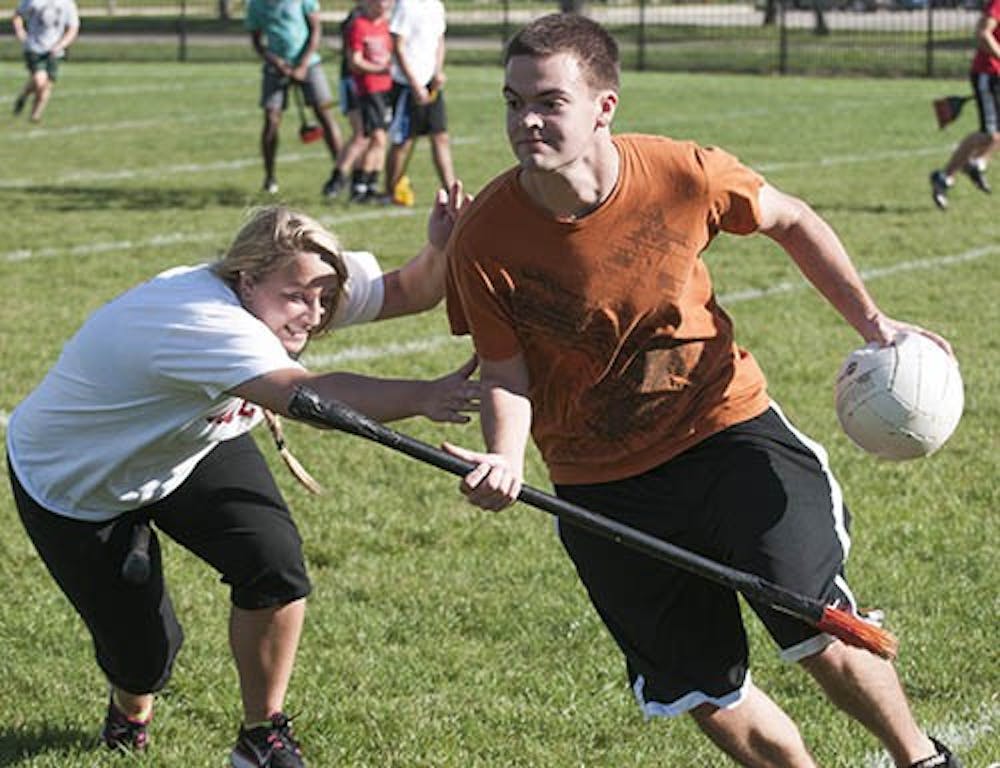 Freshman John Kraft attempts to dodge a block from another student during Quidditch practice on Sept. 9, 2012. The school’s Quidditch team, the Ball State Horcruxes, will travel to compete in the Quidditch World Cup on Friday. DN FILE PHOTO BOBBY ELLIS