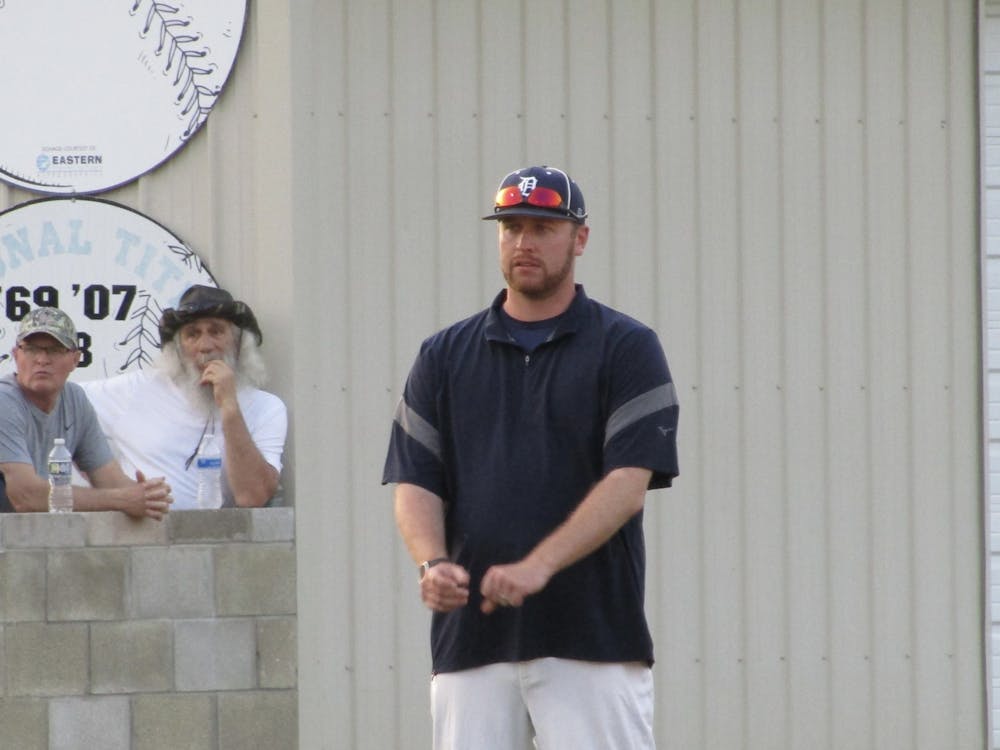Delta High School Baseball head coach Devin Wilburn takes in the action between the Eagles and Wes-Del in the first round of the 2022 Delaware County Baseball Tournament in Yorktown, Indiana, May 10, 2022. The Eagles defeated the Warriors 4-2 and eventually finished runner-up in the tournament, losing to Yorktown 11-2. (Kyle Smedley/DN)