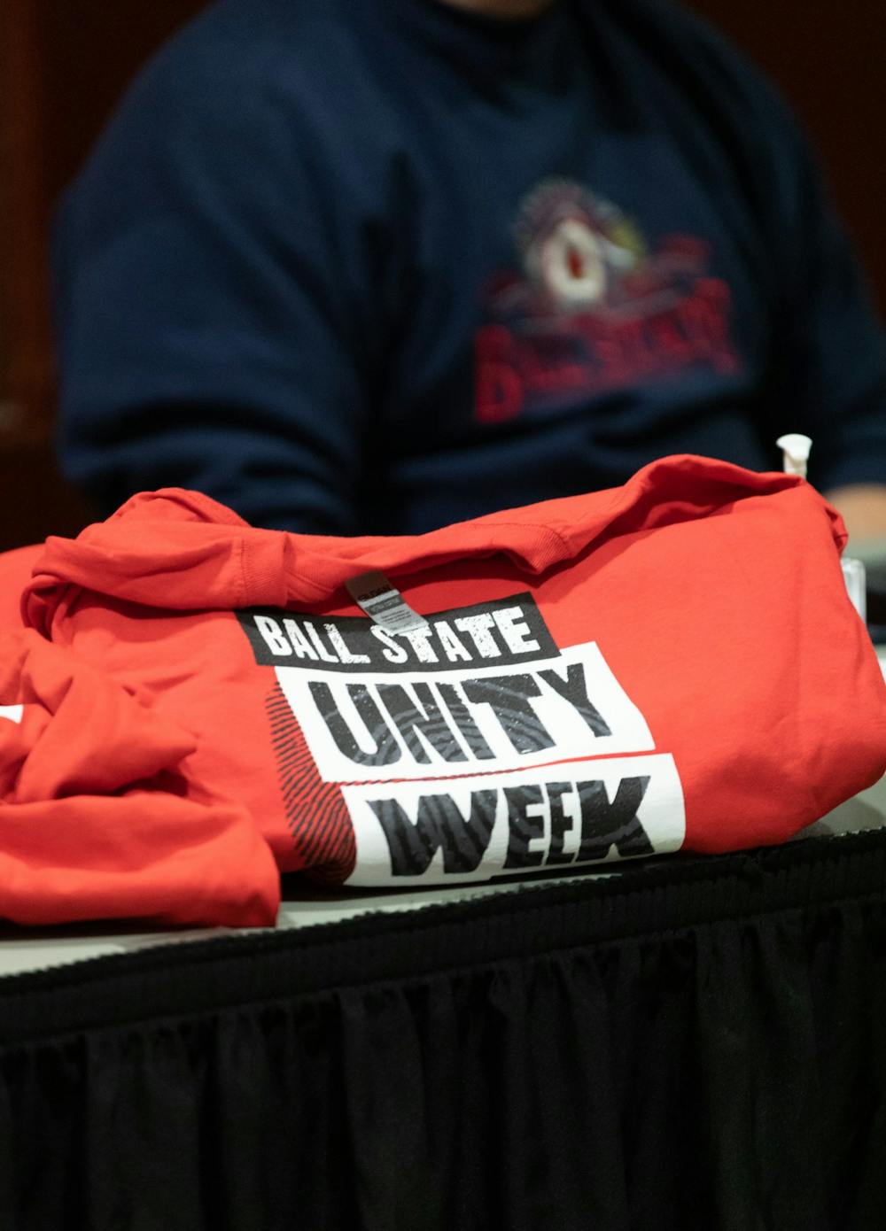 <p>Ball State Unity Week shirts sit on display outside the Student Center Ballroom Jan. 20  at the L.A. Pittenger Student Center. Participants who came to the Boxes and Walls event were given shirts for their participation. <strong>Eli Houser, DN</strong></p>