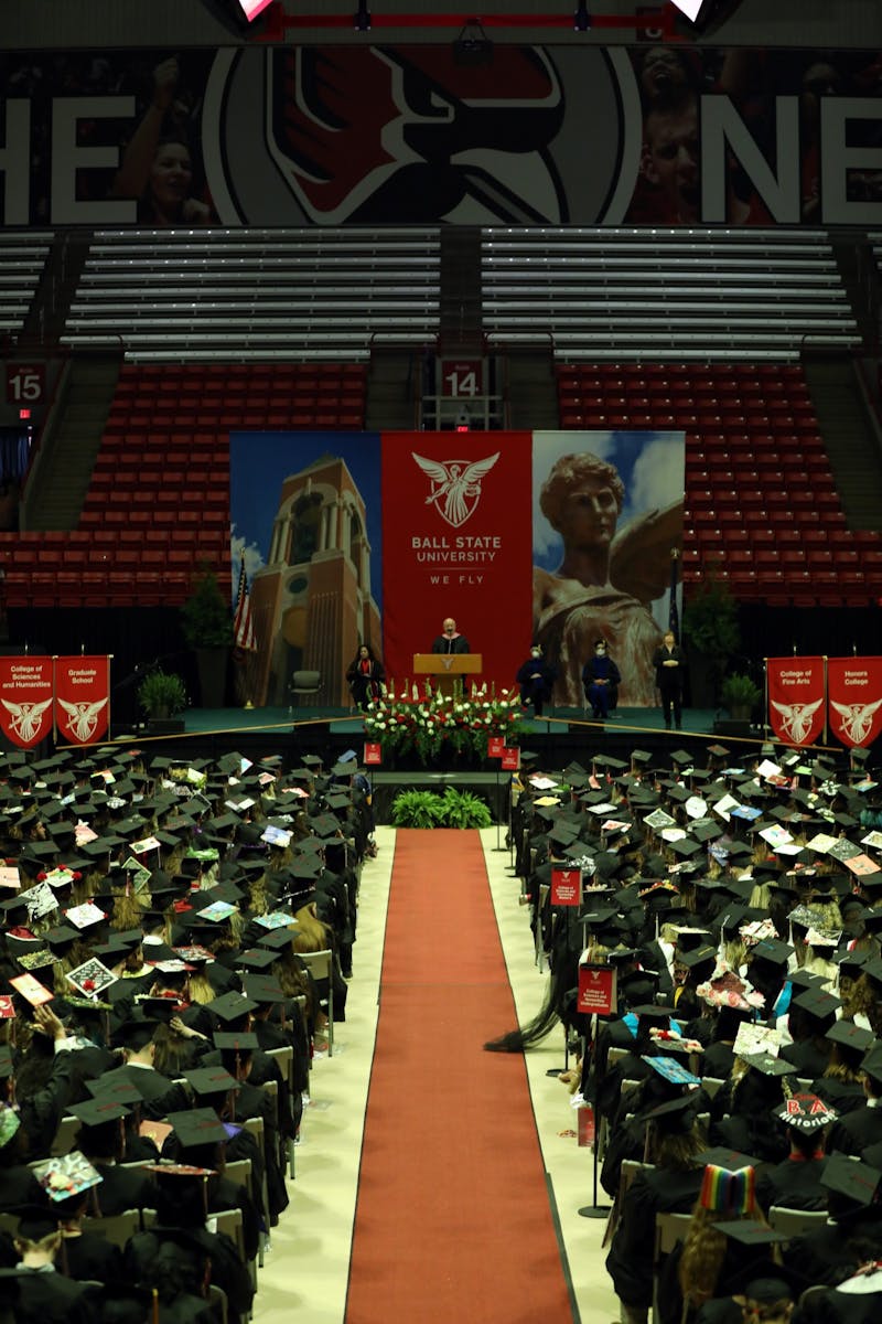 College of Fine Arts graduates sit awaiting the 2022 commencement ceremony to begin May 7 in Worthen Arena. Rylan Capper, DN 
