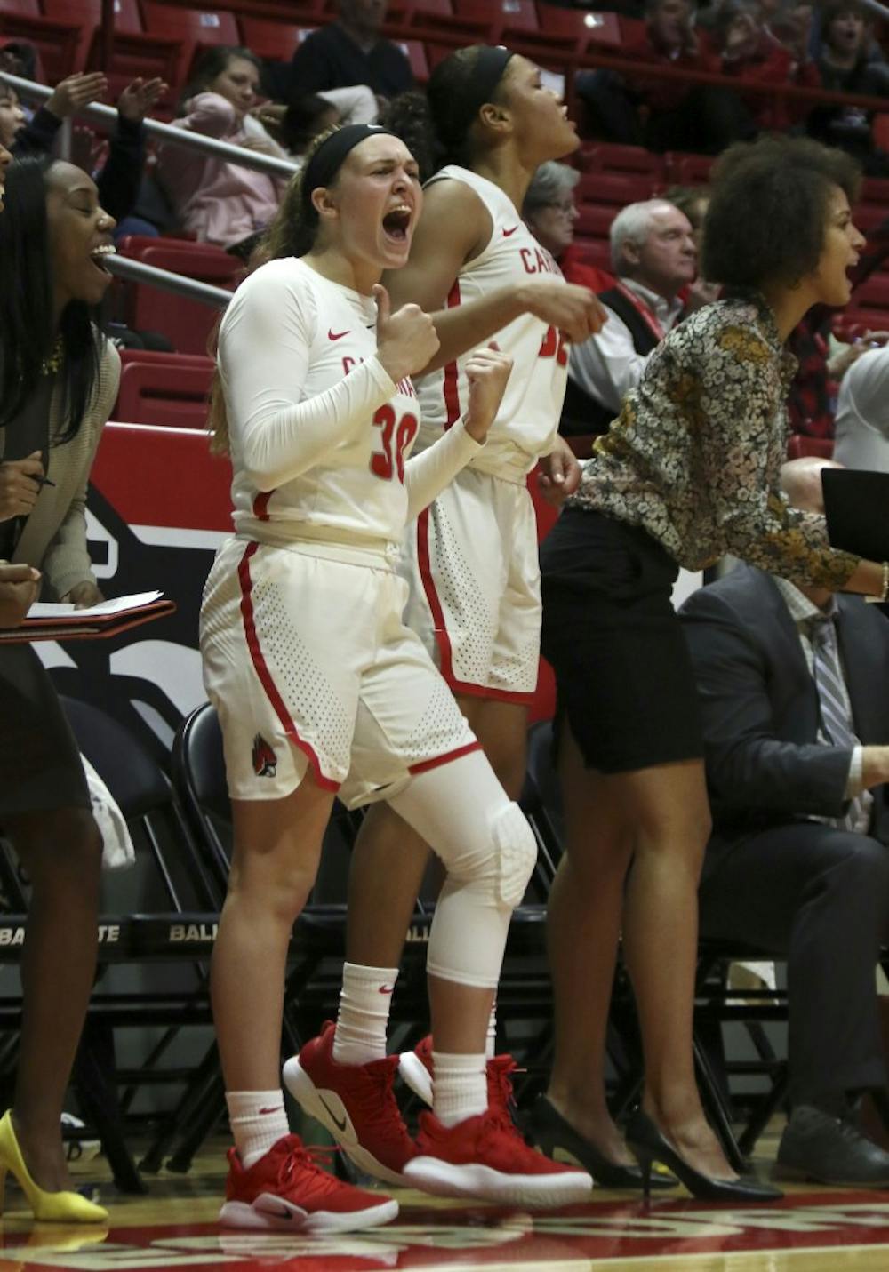 <p>Ball State freshman Anna Clephane celebrates a 3-pointer by senior Jasmin Samz against Cleveland State Nov. 11, 2018, in John E. Worthen Arena. Ball State won 67-62. <strong>Paige Grider, DN</strong></p>