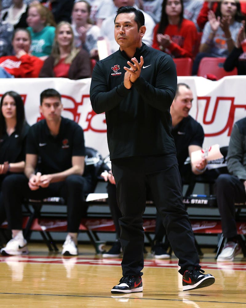 Ball State men's volleyball Head Coach Donan Cruz claps on the sidelines in a game against Ohio State in MIVA Tournament Finals April 22 at Worthen Arena. Ball State fell to Ohio State 3-1. Amber Pietz, DN