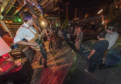 The Apathy Wizards play to a crowd at Be Here Now during the Muncie MusicFest on Sept. 14, 2013. The music fest is back this year after not running in 2014. DN FILE PHOTO JONATHAN MIKSANEK