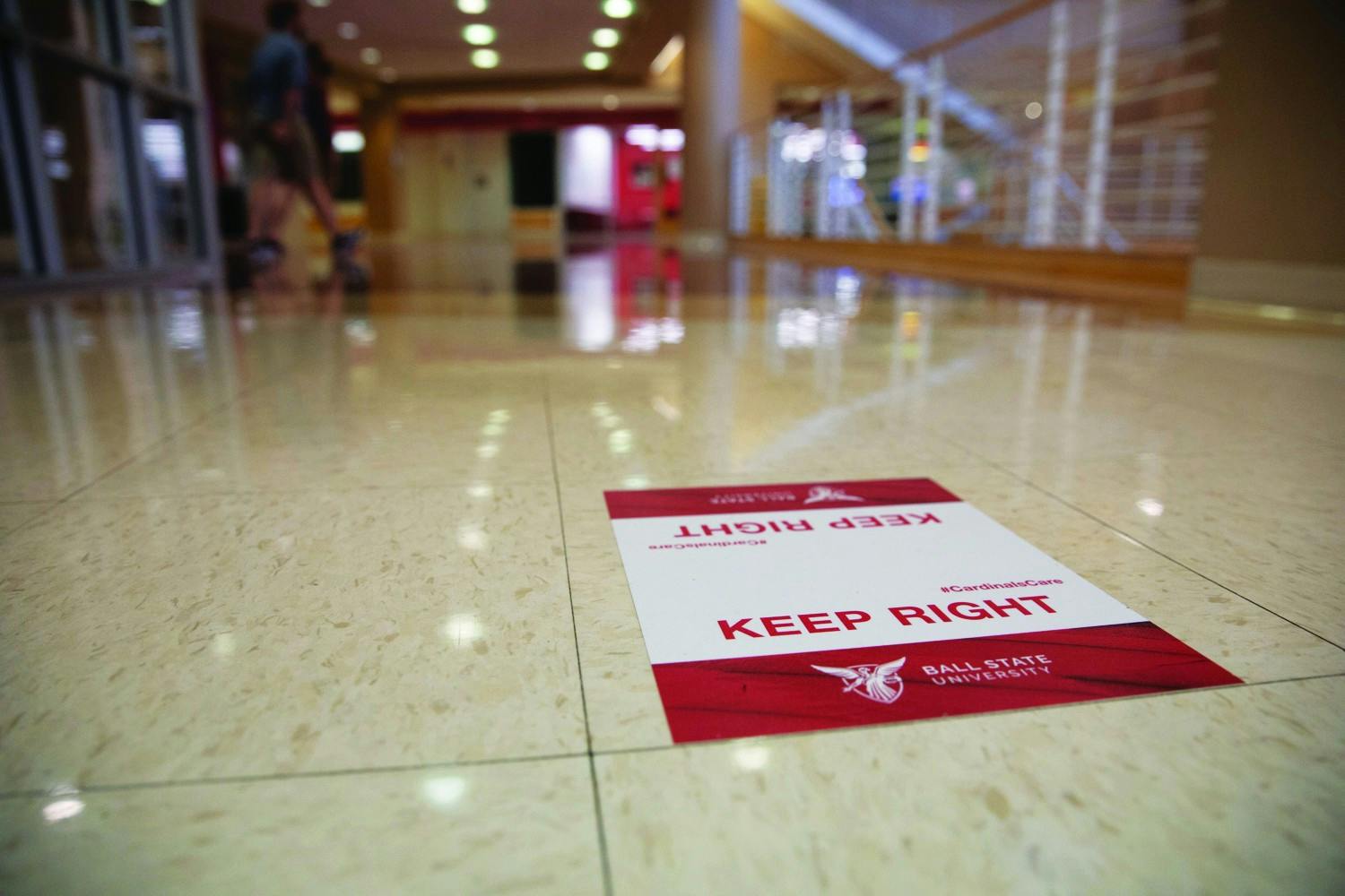 Signs directing people to walk on the right side of hallways were put up around Ball State University to keep people on one side of the path they are walking on. Jacob Musselman, DN