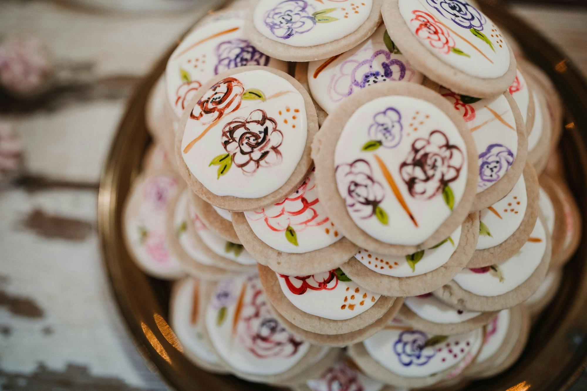 Sea Salt and Cinnamon&#x27;s frosted cookies are displayed on a tray. Everything President and co-owner of Sea Salt and Cinnamon Amanda Reninger makes is completely vegan with no eggs, dairy, meat or animal products. Courtney Schmoll, Photo Provided