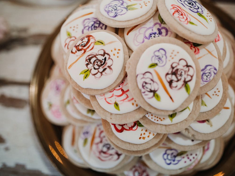 Sea Salt and Cinnamon's frosted cookies are displayed on a tray. Everything President and co-owner of Sea Salt and Cinnamon Amanda Reninger makes is completely vegan with no eggs, dairy, meat or animal products. Courtney Schmoll, Photo Provided